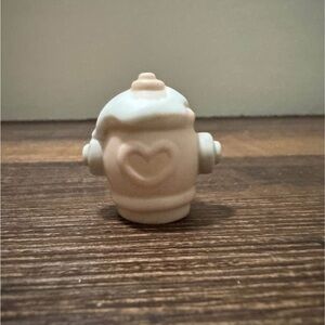 Precious moment fire hydrant figurine